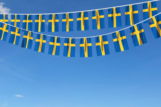 Sweden flag festive bunting hanging against a blue sky. 3D Render