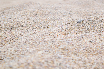 Fototapeta na wymiar Pebbles on the beach in Samothraki, Greece. Sea rocks. Background, Texture, Detail, close up