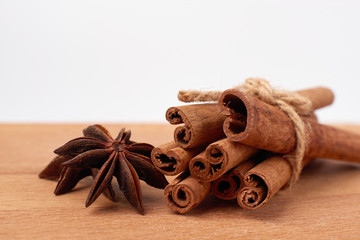 Obraz na płótnie Canvas Cinnamon sticks and anise isolated on white background. Spice.