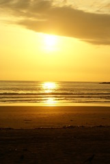 Obraz premium sunset on the beach in north goa