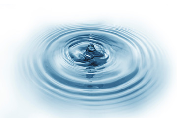Splash water, water dripping on the water surface Blue water wave Isolated on white background