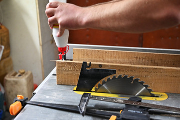 carpenter cutting wood with wood