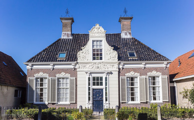 Fototapeta na wymiar Facade of a historic house in the center of Heeg, Netherlands