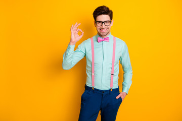 Photo of handsome cool clothes guy boyfriend self-confident person showing okey symbol express...