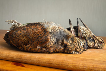 woodcocks and snipe are on the kitchen table