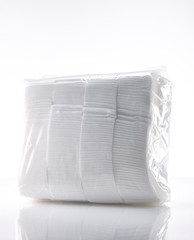 a scene in which a large amount of square cotton is contained in a large transparent cover.