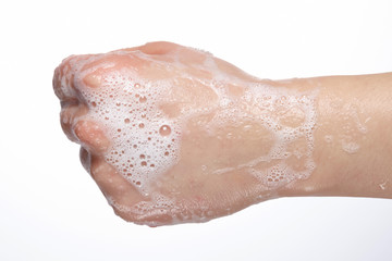 hands covered with soap bubbles.