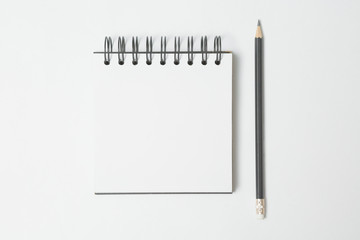 Top view of Pencils and notepads  on white background