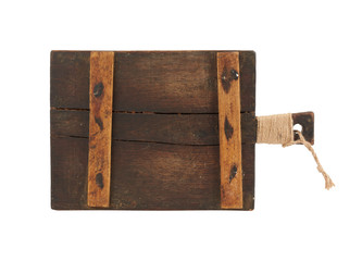 very old brown rectangular wooden kitchen cutting board with handle