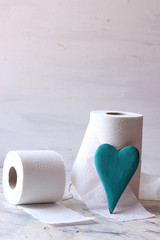 White toilet tissue,paper with a heart on a white background