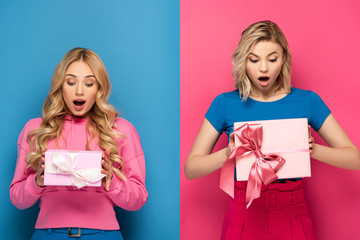 Shocked blonde girls holding gift boxes on blue and pink background