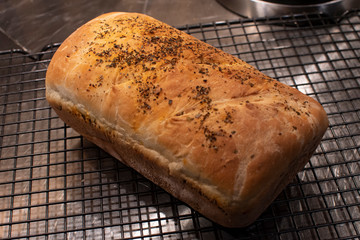 Homemade bread cooling on a rack