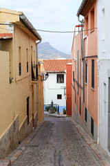 on the cosy narrow street in the medieval old town of sagunto, Spain