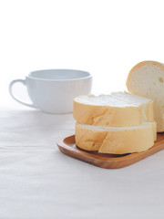 Breakfast, bread and coffee on the table