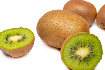 Ripe kiwi on a white background. Fresh green exotic fruit, waiting to be eaten