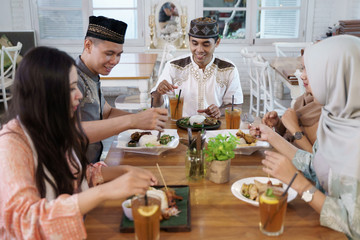 portrait of muslim friend having dinner for break fasting together