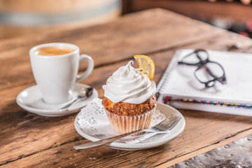coffee with milk with cupcake note and glasses