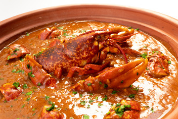 Lobster stew in a clay pot dish. Caldereta de bogavante