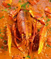 Lobster stew in a clay pot dish. Caldereta de bogavante