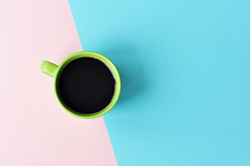 Americano in cups on the pink background.