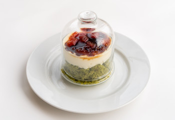 Creamy pie with basil, cheese and tomato jam in a glass. Bizcocho Mediterráneo