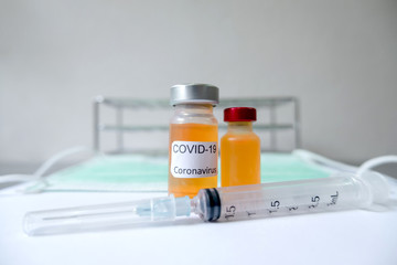 Professional doctors perform testing and analyzing samples of COVID-19 vaccines for immunization prevention and treatment from viral infections. Medical and health care concepts