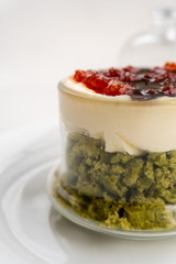 Creamy pie with basil, cheese and tomato jam in a glass. Bizcocho Mediterráneo