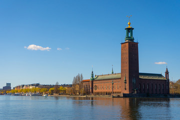 The Stockholm City Hall (Stockholms stadshus). View with Malaren lake from the old town (gamla stan).
