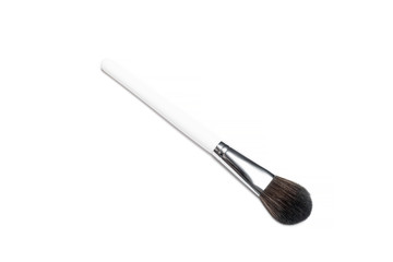 Professional makeup brushes isolated on a white background.