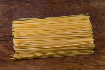 spaghetti on a wood background