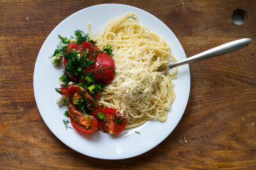 cooking italian pasta with tomato salad at home cooking