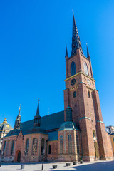 Fototapeta premium Riddarholm Church (Riddarholmskyrkan). Old town in Stockholm. Photo of medieval architecture.