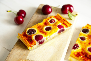 Cherry cake baked in a wood surface