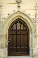 Fototapeta na wymiar old wooden door in church