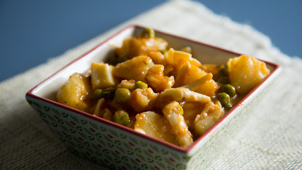 Stewed seafood with potatoes and vegetables