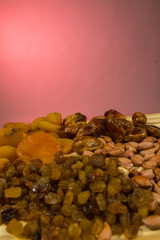 Eastern sweets, dried fruits, raisins, dates, dried apricots, peanuts.