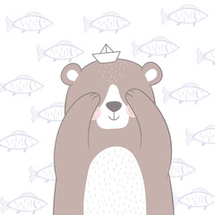 Postcard cute bear with a ship on the background of fish.