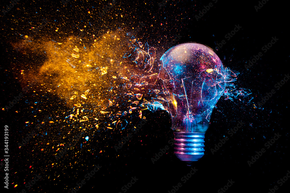 Wall mural explosion of a traditional electric bulb. shot taken in high speed