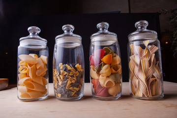 pasta in a glass bowl on a table in the studio