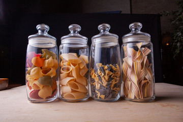 pasta in a glass bowl on a table in the studio