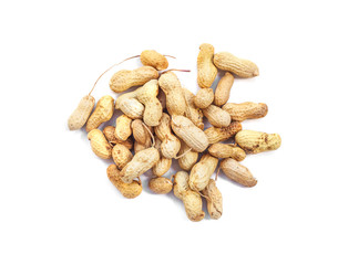 Inshell peanuts heap on white background