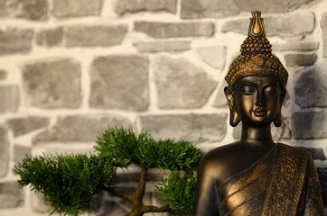 Bronze Buddha figurine statue in close up. Buddhisem, Buddha, zen, relaxation concept.