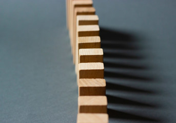 Tree blocks isolated on gray background, strategy game as a business plan for team work.