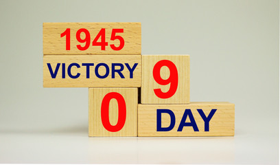 May 9th. Wooden cubes with date of 9th May. May 9 victory day Russian patriotic military holiday. The complete surrender of Germany on May 9, 1945 at 0.43 Moscow time.