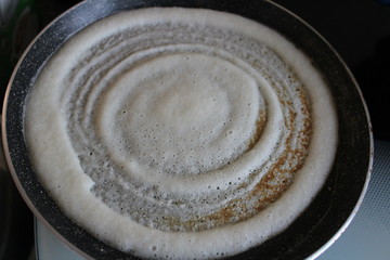 Dosa on the frying pan