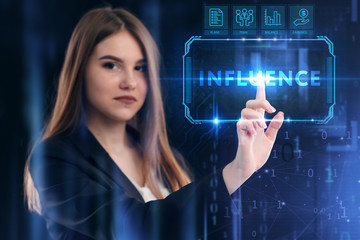 Business, Technology, Internet and network concept. Young businessman working on a virtual screen of the future and sees the inscription: Influence