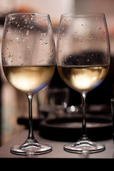 two glasses of white wine
