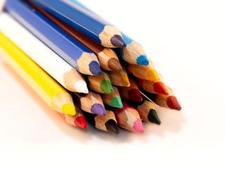 colored pencils on white background