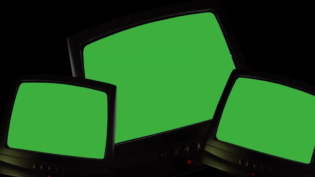 Three vintage TVs on black background, televisions switching on green screen, chroma key screens for pictures, videos or writing. TV screen changing colors, noise static or bad signal reception