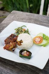 ayam balado. indonesian food cuisine chicken with chilli paste served with rice